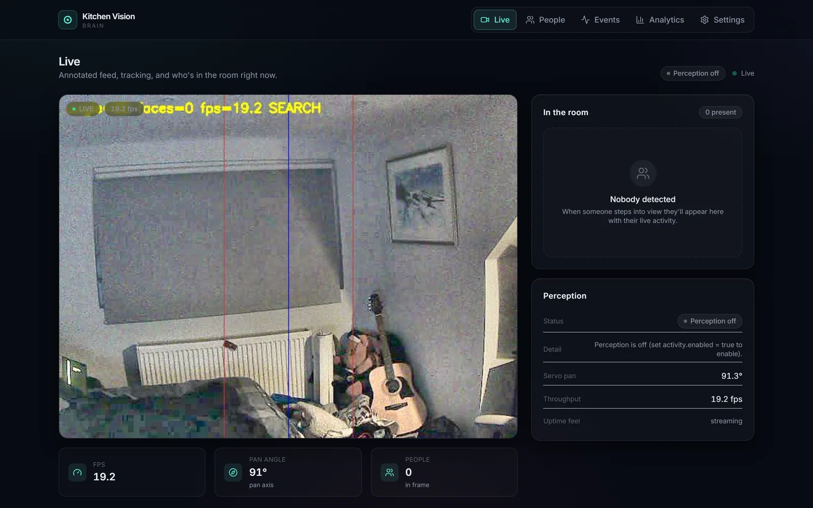 The Kitchen Vision dashboard on its Live tab: the camera feed of a room with tracking lines drawn over it, beside status tiles.